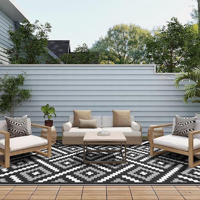 GENIMO Outdoor Rug for Patio Clearance, 6'x9' Waterproof Camping Mat, Reversible Plastic Straw Rugs for RV, Camper, Balcony, Backyard, Picnic, Deck (Mix Black White)